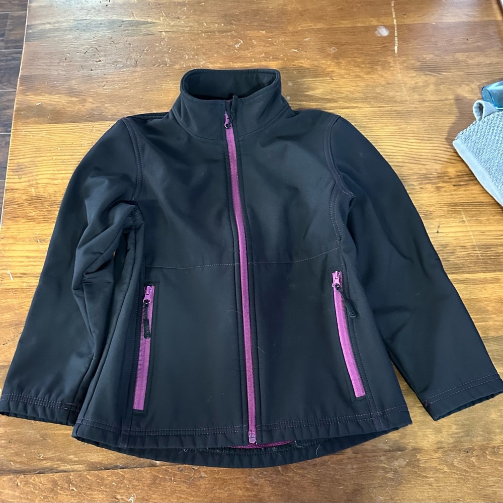 Very nice girls size large softshell jacket. Pink lining and pink piping. - Picture 1 of 4